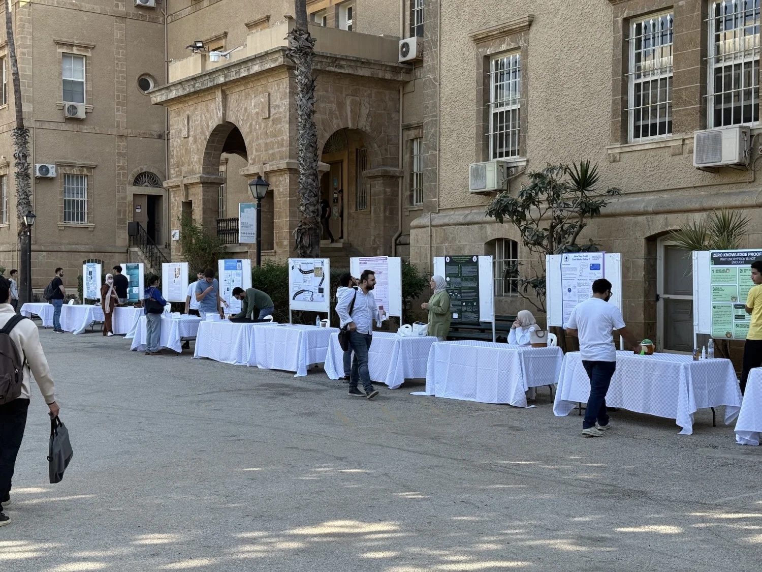 Students giving presentations on the AUB campus
