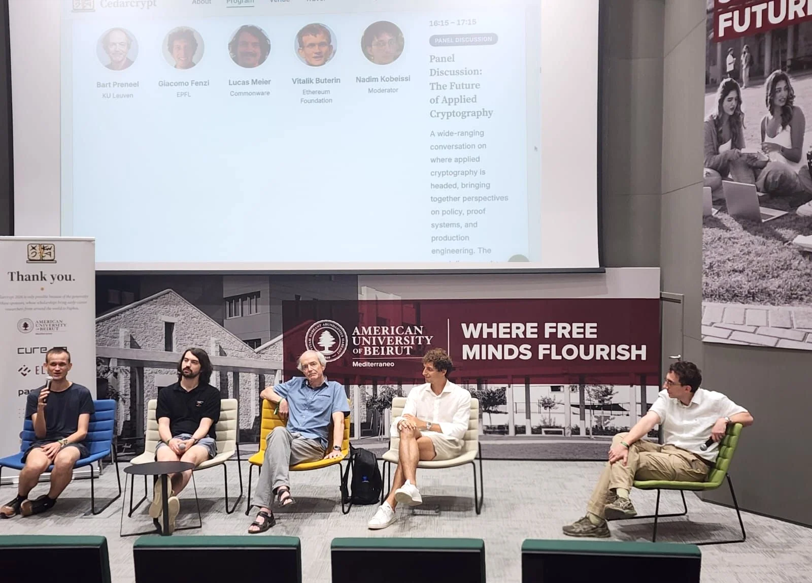 Panel discussion on stage at Cedarcrypt with Vitalik Buterin, Lucas Meier, Bart Preneel, Giacomo Fenzi, and Nadim Kobeissi